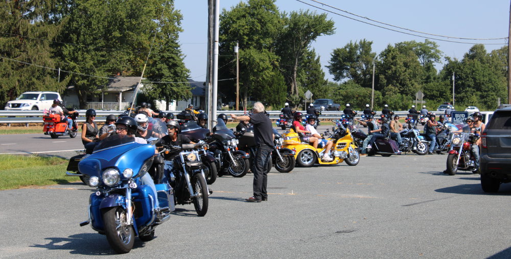 motorcycles getting ready to leave for the Benedictine at one of the rally sites for the 2019 Chrome City Ride